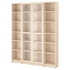 a white bookcase with glass doors and shelves