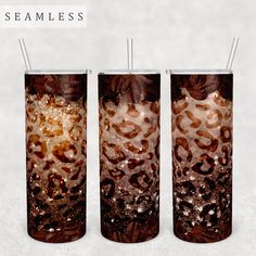 three tumblers with straws in them sitting next to each other