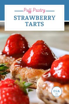 strawberry tarts on a plate with text overlay that reads puff pastry strawberry tarts