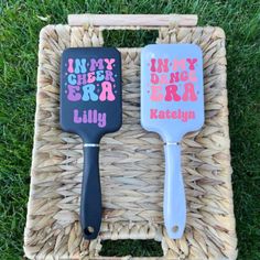 two spatulas sitting on top of a wicker basket next to each other