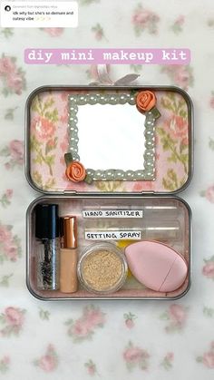 two tins with different items in them sitting on a floral tablecloth covered surface