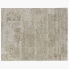 an area rug with squares and rectangles is shown in light gray tones on a white background