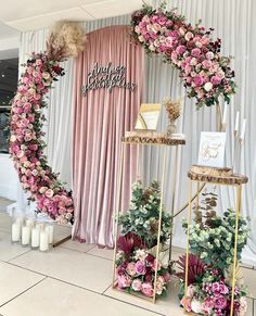 an image of flowers and candles on display