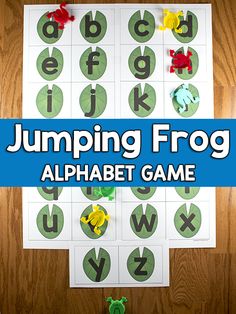 the jumping frog alphabet game is displayed on a table