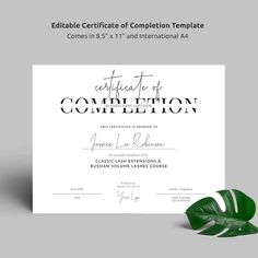 a certificate is shown with a green leaf on the front and bottom corner, along with a white background