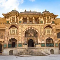 an ornate building with steps leading up to it