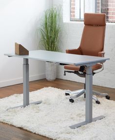 an office chair sitting on top of a white rug