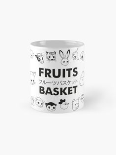 a white coffee mug with the words fruits and animals on it, in black ink