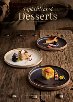 two plates with desserts on them sitting on a wooden table next to a pillow