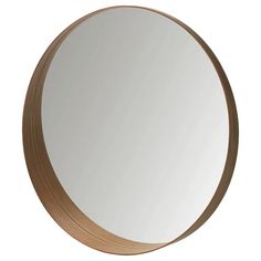 a round mirror on a white background