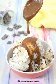 a bowl filled with ice cream and chocolate chips