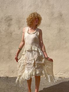 Magnolia Pearl Cream Gauze Ruffle Dress! AMAZING amazing amazing. 100% silk with ruffles and lace details. Made in USA. Can fit many sizes, please refer to measurements. In excellent condition and so unique. Model is wearing it with a ruffled slip underneath, sold separately. Approx. Measurements: Underarm to Underarm: 21" Length: 36" (shortest tier) - 55" Summer Silk Ruffle Dress, Silk Ruffle Dress For Summer, Bohemian Lace Dress With Ruffle Hem, Beige Silk Dress With Ruffles, Sleeveless Silk Dress With Ruffles, Cream Silk Dress With Ruffles, Flowy Cream Dress With Ruffles, Flowy Cream Dresses With Ruffles, Silk Tiered Dress With Ruffle Hem