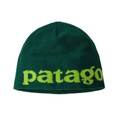 a green hat with the word patago written in yellow on it, against a white background