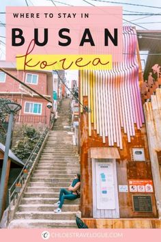 a woman sitting on some steps with the words where to stay in busan korea