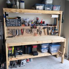 a workbench with tools on it in a garage