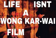 a man and woman standing next to each other in front of a wall with the words life isn't a wrong kar - wai film