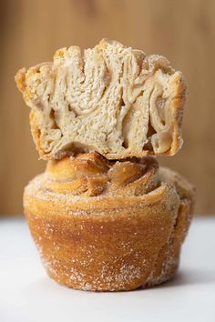 a close up of a muffin with icing on top