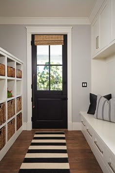 the entryway is clean and ready for us to use as a storage area in the house