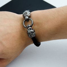 #lionbracelet #mensilverbracelet #fashionjewelry Adjustable Skull Leather Bracelet Gift, Gothic Black Leather Skull Bracelet, Luxury Adjustable Skull Bracelets, Adjustable Black Leather Bracelet With Lobster Clasp, Motorcycle Chain Bracelet, Silver Man, Infinity Bracelet