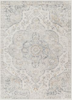 an area rug with grey, beige and white colors on the floor in front of a gray background