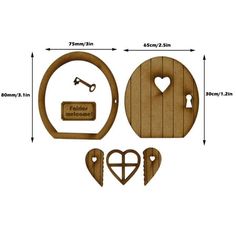 a wooden cutting board with two heart shaped cutouts and a key to the door