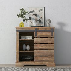 a wooden cabinet with drawers and doors on the bottom, in front of a white wall