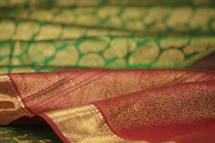 The mango motif is a perennial favourite of craftsmen all over India. In kanjivarams, it is woven in different sizes; not just on the border and mundhanai but also as small stylised buttas dotting the body. #kanakavalli #lovekanakavalli #kanjivaram #silk #sari #motif #varnasutra #flower #plant #handloom #india Mango Motif, On The Border, Flower Plant, Pure Silk Sarees