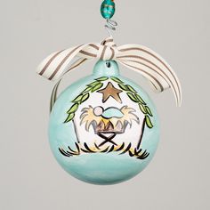 a glass ornament with a dog on it