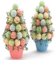 two vases with fake easter eggs in them