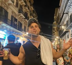 a man standing in the middle of a crowded street