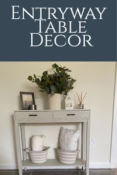 the entryway table is decorated with white baskets and plants