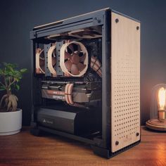 a computer case sitting on top of a wooden table