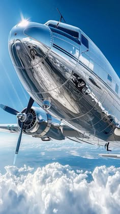 an airplane is flying high above the clouds