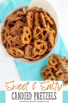 sweet and salty candied pretzels in a white bowl on a blue napkin