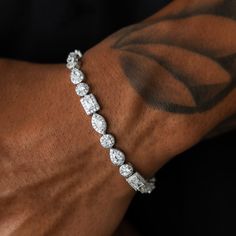 Introducing the Mixed Diamond Pave Bracelet in 14k White Gold, featuring hand-set stones in a variety of shapes and sizes for maximum shine. The captivating design gives you an bold look that's great for any occasion—from everyday wear to special events. With its sleek and modern design, you’ll be sure to make an impression wherever you go! Pair it with the matching Mixed Diamond Pave Chain to create the perfect set. This product is guaranteed for life – GLD will repair or replace the item shoul