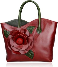 PRICES MAY VARY. Designer Handbag: Pure color beautiful leather with Three-dimensional handmade blooming flower and green leaf, make this handbags become lively, unique and graceful, beautiful. Is a stylish accessory to match fall and winter costumes. Genuine Leather: Made of high quality wax oil leather with handmade leather blooming flower. fabric lining, Golden color zipper, Genuine Leather double handles. Dimensions: L 12.5 x W 4.5 x H 12.5 inches; Double handles height: 7 inches; Weight : 1 Designer Purses And Handbags, Flower Handbag, Cheap Purses, Genuine Leather Purse, Cute Purses, Handbags For Women, Beautiful Bags, Leather Satchel, Leather Tote Bag