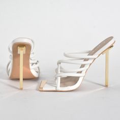 - White Thong Mule - Gold Front Trim - Gold Stiletto Heel - Approx. 4” * Runs True To Size Chic White Fitted Sandals, Fitted White Heels With Wrapped Heel, Fitted White Sandals For Night Out, Elegant White Sandals For Night Out, Chic Fitted White Sandals, White Heels With Wrapped Heel For Night Out, White Sandals With Padded Heel For Night Out, White Heels With Padded Heel For Night Out, Trendy White Strappy Heels