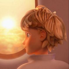 a close up of a child's head looking at the sun