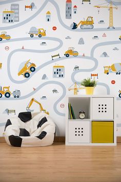 a child's room with construction themed wallpaper