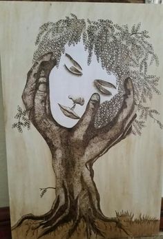 a drawing of a woman's face with her hands in the air, underneath a tree