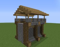 an image of a small structure made out of wood and stone in the middle of a field