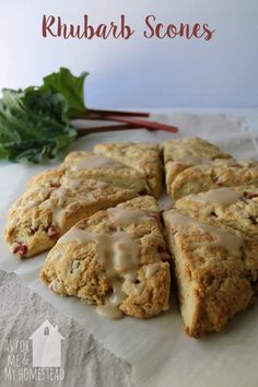 some scones are sitting on a white paper