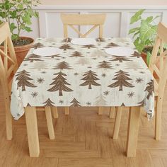 a table with a christmas tree print on it