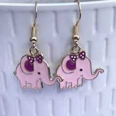 Adorable pink novelty elephant earrings these come on gold plated hooks these make a great gift for lovers of fun quirky earrings. Not suitable for young children due to choking hazard I have lots of other fun earrings  https://hilarysgifts.etsy.com    Please use code SAVE10 when purchasing 5 items from my store for 10% off Earrings Kawaii, Aesthetic Earrings, Spider Earrings, Kawaii Earrings, Elephant Earrings, Earrings Aesthetic, Quirky Earrings, The New Me, Pink Elephant