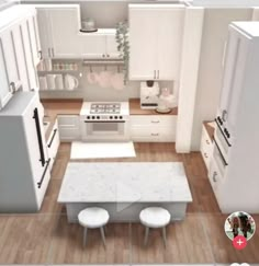 an aerial view of a kitchen and dining room with white appliances, counter tops, and cabinets