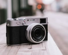 a camera sitting on top of a wooden table