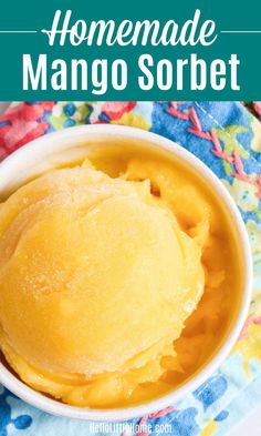 homemade mango sorbet in a white bowl with text overlay that reads homemade mango sorbet