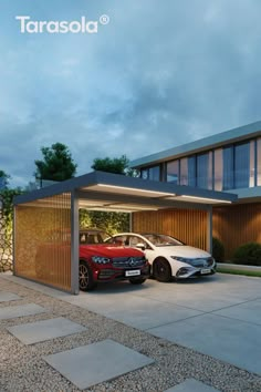 two cars are parked in front of a modern house at dusk, one is red and the other is white