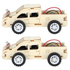 two wooden toy trucks with wheels and tires