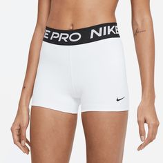 Style No. CZ9857-100 Color: White/Black The Nike Pro Shorts are made with stretchy, sleek and supportive fabric that wicks sweat to help you stay dry and comfortable during your workout. Nike Dri-FIT technology helps you stay dry, comfortable and focused. A wide, mid-rise elastic waistband feels supportive around your core. Tight fit for a body-hugging feel. 78% polyester/22% spandex. Nike Pro Women's 3" Shorts. White Nike Pros, Nike Spandex, Cute Nike Outfits, Nike Pro Women, Nike Pro Shorts, Spandex Shorts, Training Shorts, Active Wear Shorts, Athletic Apparel